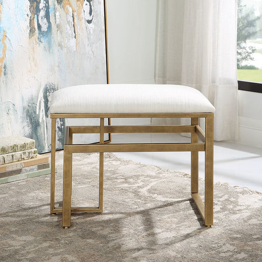 Aventri Antique Brushed Brass Accent Stool | Modern Iron Frame with Off White Cushion (25 in. W x 19 in. H x 16 in. D)
