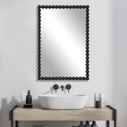 Uttermost Serna 09789 black modern rectangle bathroom vanity mirror with iron beaded frame in satin black, 21 in. W x 30 in. H